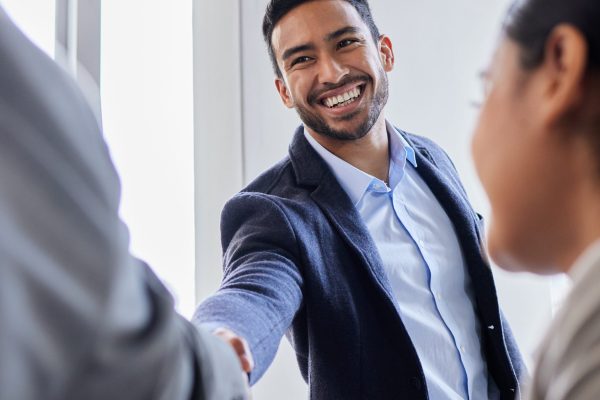 Pleased to meet you. Shot of two business people shaking hands during a meeting